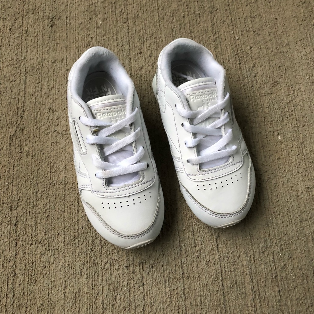 All white Reebok’s